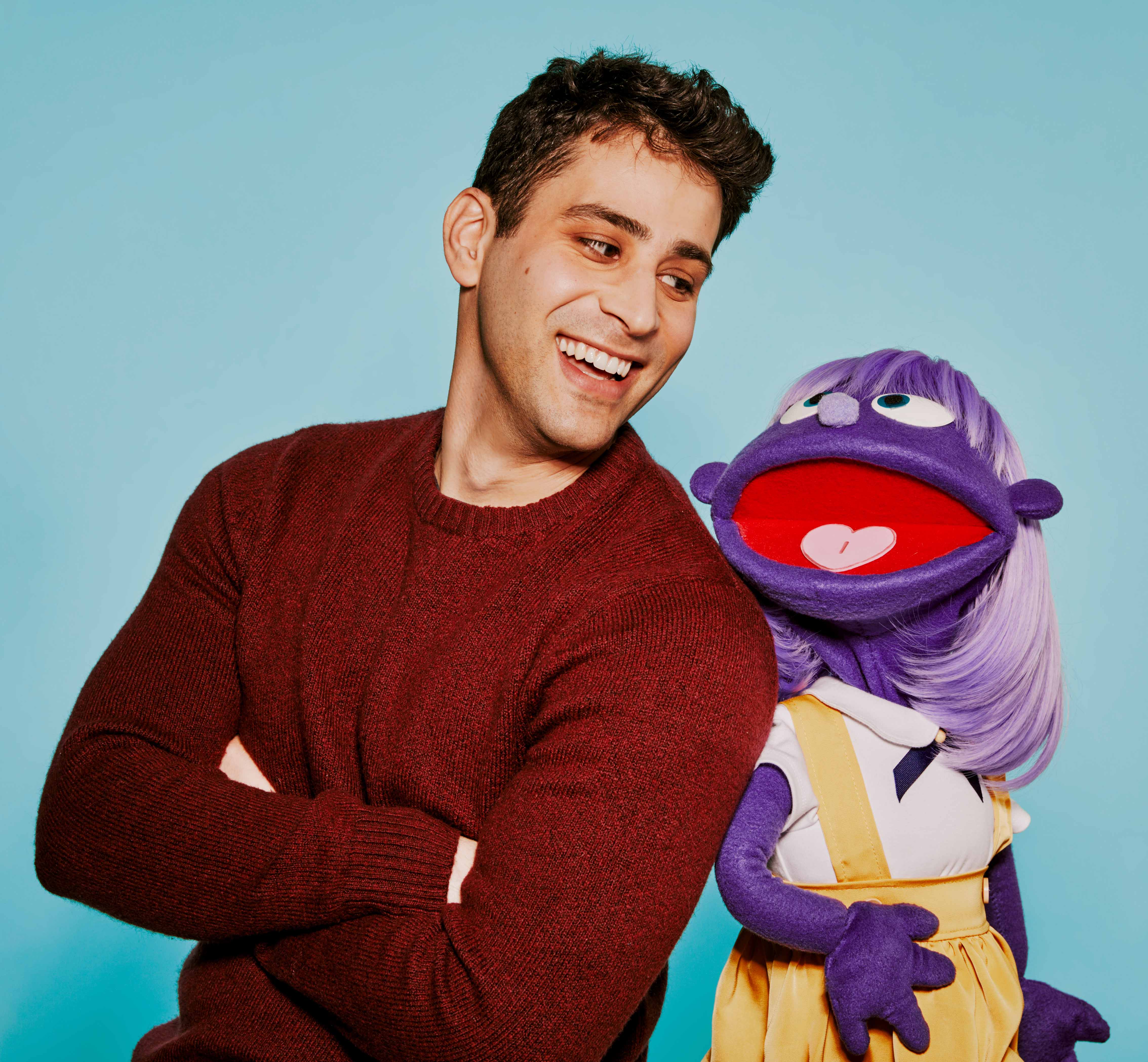 Evan with purple puppet