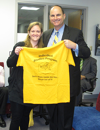 Women and Man with Yellow IVSP t-shirt