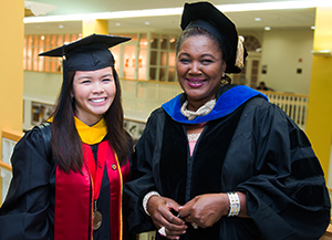 Gloribel and her mentor at Spring Graduation 2013